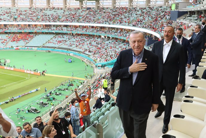 HANDOUT - 16 June 2021, Azerbaijan, Baku: Turkish President Recep Tayyip Erdogan attends the UEFA Euro 2020 Group A soccer match between Turkey and Wales at the Baku Olympic Stadium. (Best Quality Available) Photo: Mcm/Turkish Presidency/dpa - ATTENTION