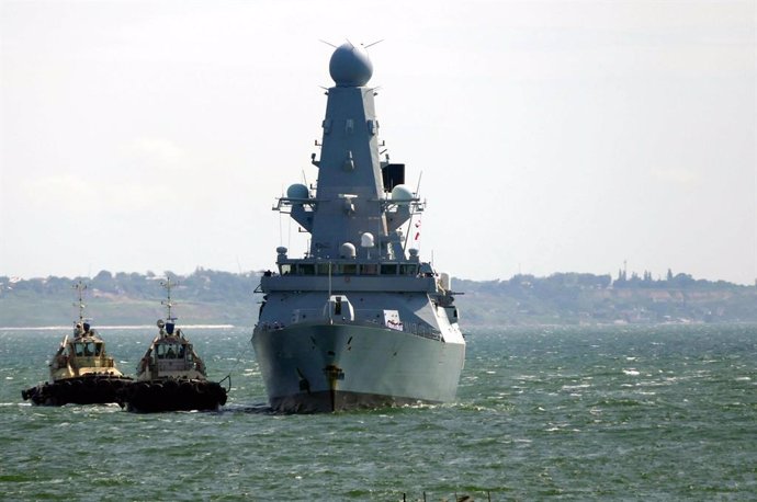 18 June 2021, Ukraine, Odesa: The Royal Navy destroyer HMS Defender arrives in the port of Odessa. The Russian military warned away the British Navy's HMS Defender warship with bombs and gunfire after it allegedly entered Russian territorial waters near
