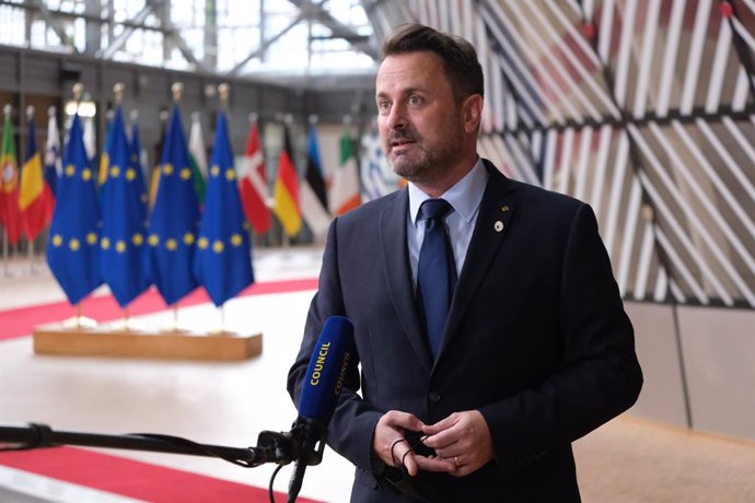 HANDOUT - 25 June 2021, Belgium, Brussels: Luxembourg's Prime Minister Xavier Bettel speaks to media as he arrives to attend the second day of the European Union summit at the European Council. Photo: Alexandros Michailidis/European Council/dpa - ATTENT