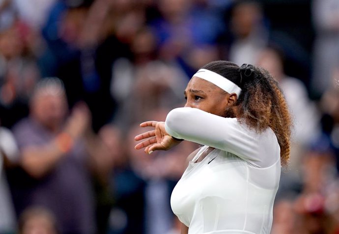 29 June 2021, United Kingdom, London: American tennis player Serena Williams leaves the court after withdrawing from her women's singles first-round match against  Belarus' Aliaksandra Sasnovich on day two of the 2021 Wimbledon Tennis Championships at T