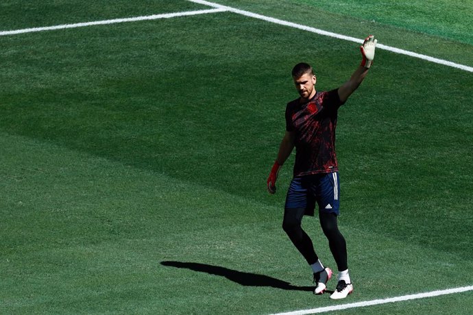 Unai Simon of Spain warms up during the UEFA EURO 2020 Group E football match between Slovakia and Spain at La Cartuja stadium on June 23, 2021 in Seville, Spain.