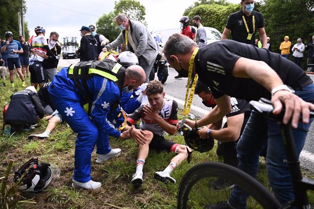 German Jasha Sutterlin of Team DSM receives medical treatment after a fall during the first stage of the 108th edition of the Tour de France cycling race, 197.8 km from Brest to Landerneau