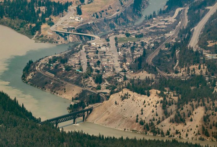 01 July 2021, Canada, Lytton: An aerial view shows the almost completely destroyed Canadian town of Lytton due to a wildfire. Photo: Darryl Dyck/The Canadian Press via ZUMA/dpa