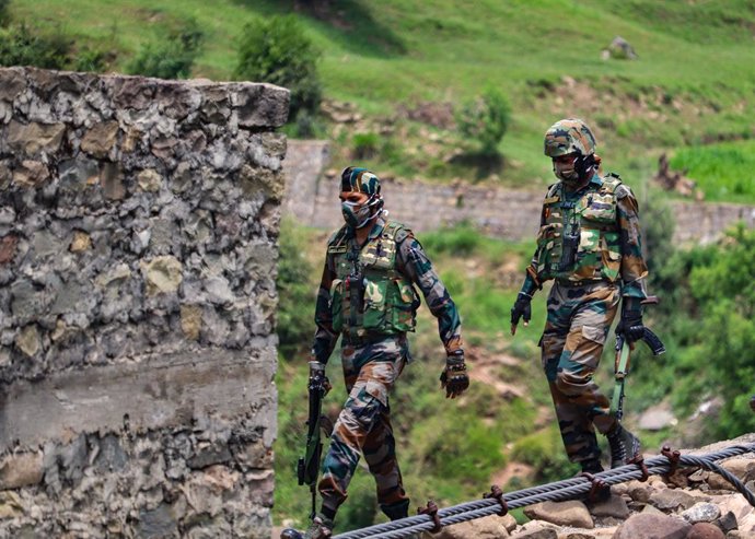 27 June 2021, India, Poonch: Indian army soldiers patrol near Line of Control (LoC) in Poonch. Photo: Nazim Ali Manhas/PTI/dpa