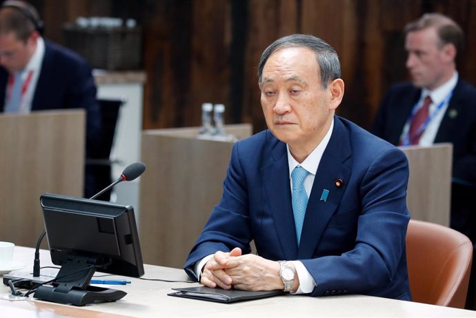 13 June 2021, United Kingdom, Carbis Bay: Japanese Prime Minister Yoshihide Suga attends a plenary session as part of the G7 Summit. Photo: Phil Noble/PA Wire/dpa