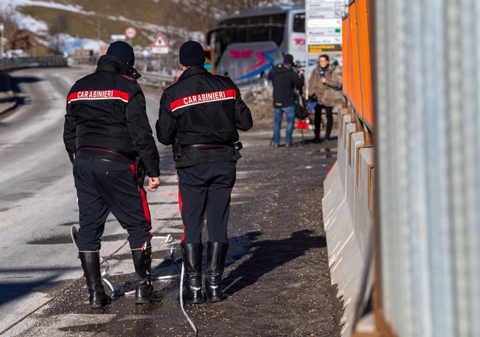 Archivo - 05 January 2020, Italy, Luttach: Two Carabinieri rescue teams reconstruct the circumstances of an accident at the scene where a drunk man drove his car into a group of tourists. Six German tourists in their early 20s were killed in northern It