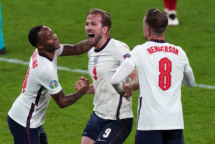 07 July 2021, United Kingdom, London: (L-R) England's Raheem Sterling, Harry Kane and Jordan Henderson celebrate winning the UEFA Euro 2020 semi final soccer match between England and Denmark at Wembley Stadium. Photo: Mike Egerton/PA Wire/dpa