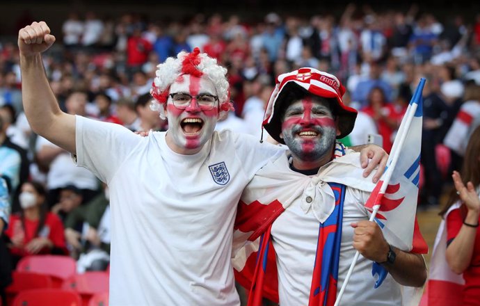 07 July 2021, United Kingdom, London: England fans show their support in the stands prior to the start of the UEFA Euro 2020 semi-final soccer match between England and Denmark at Wembley Stadium. Photo: Nick Potts/PA Wire/dpa