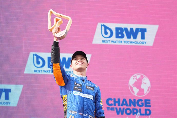 04 July 2021, Austria, Spielberg: McLaren's British driver Lando Norris celebrates his third place during the awards ceremony of the 2021 Formula One Grand Prix of Austria at the Red Bull Ring. Photo: Georg Hochmuth/APA/dpa