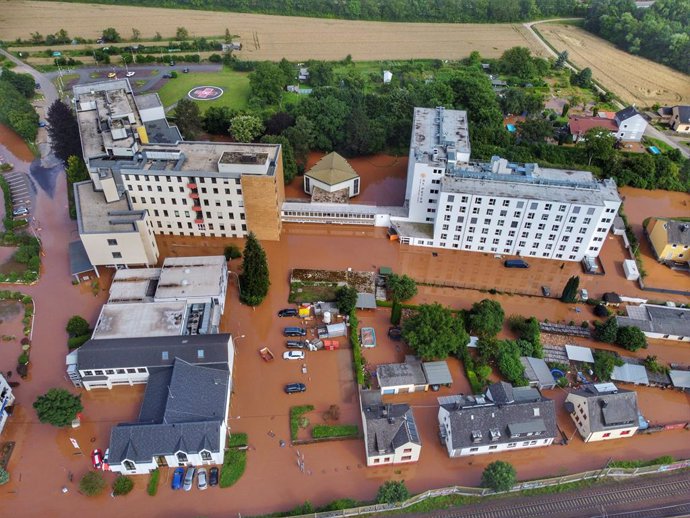 15 July 2021, North Rhine-Westphalia, Trier: An aerial view shows the Mutterhaus Ehrang hospital under water after raging floods engulfed parts of western Germany. Photo: Sebastian Schmitt/dpa