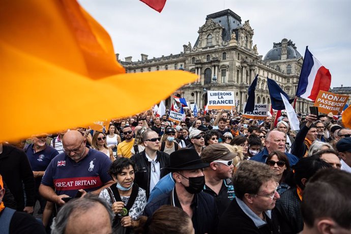 17 July 2021, France, Paris: Demonstrators take part in a protest against the new coronavirus safety measures including a compulsory health pass called for by the French government. Photo: Sadak Souici/Le Pictorium Agency via ZUMA/dpa