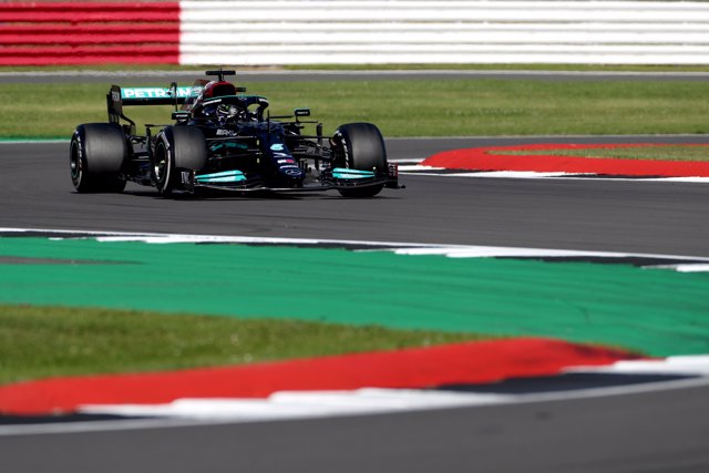 18 July 2021, United Kingdom, Towcester: British F1 driver Lewis Hamilton of Mercedes AMG Petronas, drives during the Formula One Grand Prix of Britain at the Silverstone Circuit. Photo: Bradley Collyer/PA Wire/dpa
