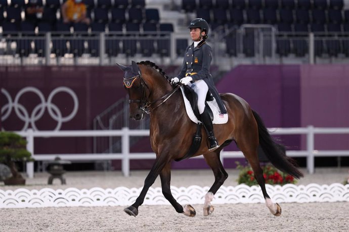 24 July 2021, Japan, Tokyo: Spain's Beatriz Ferrer-Salat riding Elegance competes in the Dressage Individual Grand Prix qualification round at the Baji Koen Equestrian Park, during the Equestrian events of the  Tokyo 2020 Olympic Games. Photo: Friso Gen