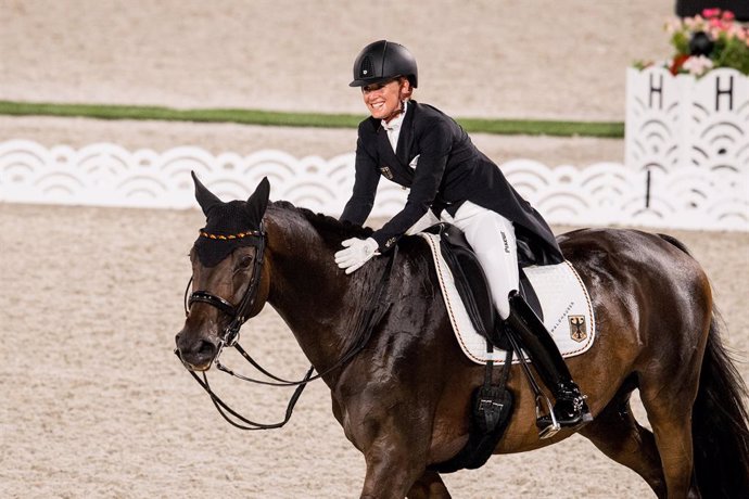 Jessica von Bredow-Werndl produced a personal-best and the biggest score of the evening with in the Dressage Grand Prix to get Team Germany off to a great start at the Tokyo 2020 Olympic Games.  Photo credit: FEI/Shannon Brinkman