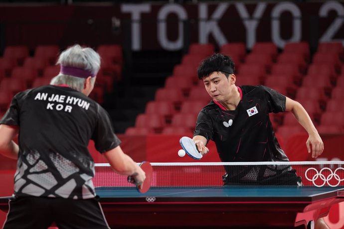 20 July 2021, Japan, Tokyo: South Korean table tennis players Jeoung Young-sik (R) and An Jae-hyun train at Tokyo Metropolitan Gymnasium ahead of the Tokyo 2020 Olympic Games set to place place between 23 July until 08 August 2021. Photo: -/YNA/dpa
