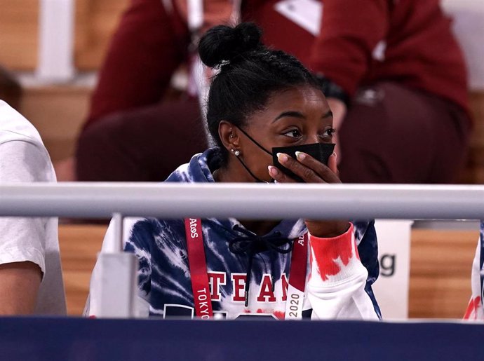 28 July 2021, Japan, Tokyo: USA's Simone Biles watches the Men's Artistic Gymnastics All-Around Final from the stands at the Ariake Gymnastics Centre, during the Tokyo 2020 Olympic Games. Photo: Mike Egerton/PA Wire/dpa