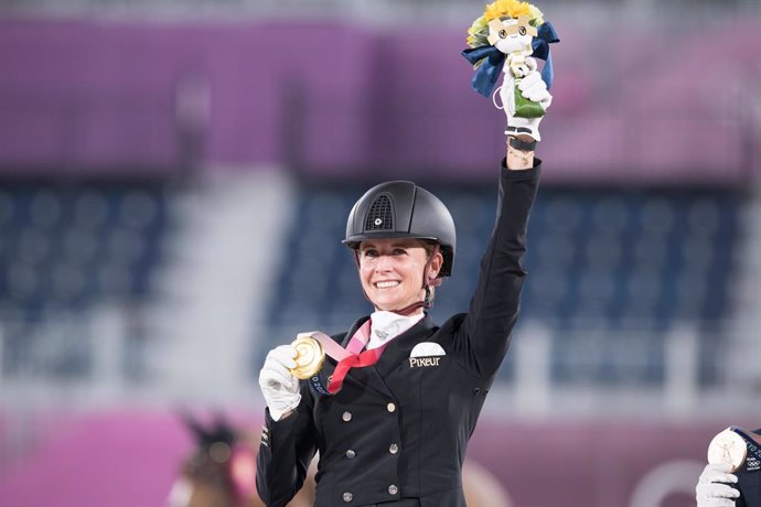 Germanys Jessica von Bredow-Werndl claimed the Individual Dressage title at the Tokyo 2020 Olympic Games with victory in the Freestyle partnering the lovely mare TSF Dalera at Baji Koen Equestrian Park tonight. (FEI/Shannon Brinkman)