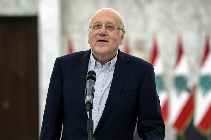 HANDOUT - 28 July 2021, Lebanon, Baabda: Lebanese Prime Minister-designate Najib Mikati speaks during a presser after a meeting with Lebanese President Michel Aoun, at the Baabda Palace. Photo: -/Dalati & Nohra/dpa - ATTENTION: editorial use only and on