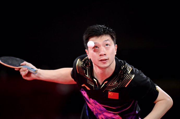 30 July 2021, Japan, Tokyo: China's Ma Long in action against compatriot Fan Zhendong in the Men's Singles Gold Medal table tennis Match at the Tokyo Metropolitan Gymnasium, during the Tokyo 2020 Olympic Games. Photo: Marijan Murat/dpa