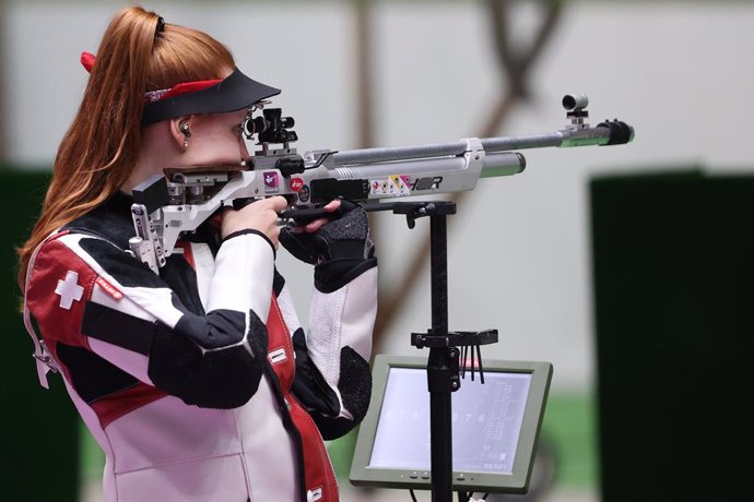 24 July 2021, Japan, Tokyo: Switzerland's Nina Christen in action during the 10m Air Rifle Women's Qualification at the Asaka Shooting Range during the Tokyo 2020 Olympic Games. Photo: Oliver Weiken/dpa