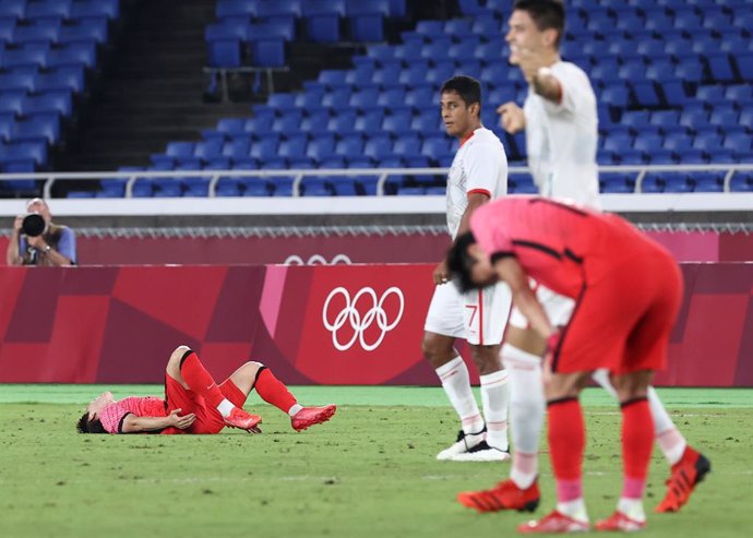 31 July 2021, Japan, Yokohama: South Korea's Lee Dong-gyeong reacts in frustration to defeat after the final whistle of the Men's quarter-final soccer match between South Korea and Mexico at the International Stadium Yokohama, in the course of the Tokyo