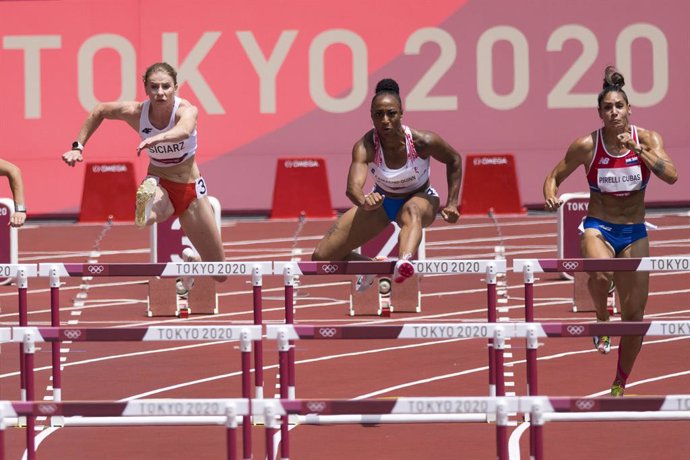 01 August 2021, Japan, Tokyo: Puerto Rico's Jasmine Camacho-Quinn (C) competes in the Women's 100m Hurdles SemiFinal race of the athletics competition at the Olympic Stadium during the Tokyo 2020 Olympic Games. Photo: Ramn ''tonito'' Zayas/El Nuevo Dia 