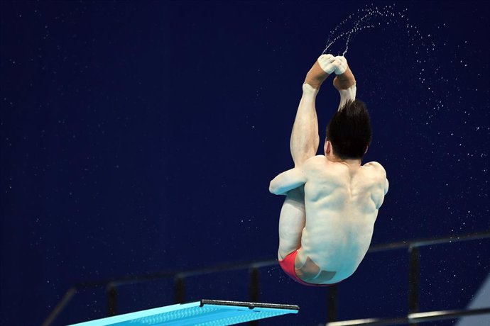 03 August 2021, Japan, Tokyo: China's Xie Siyi competes in the Men's 3m Springboard diving final at Tokyo Aquatics Centre during the Tokyo 2020 Olympic Games. Photo: Swen Pfrtner/dpa