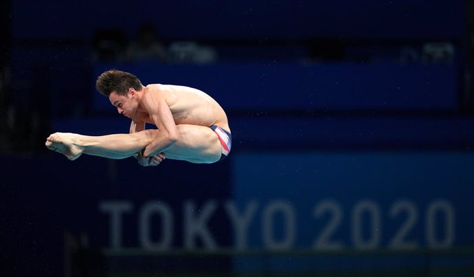 06 August 2021, Japan, Tokyo: Great Britain's Tom Daley competes in the Men's 10m Platform diving preliminary round at Tokyo Aquatics Centre during the Tokyo 2020 Olympic Games. Photo: Joe Giddens/PA Wire/dpa