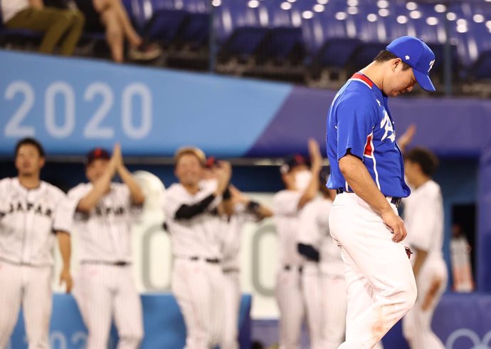 04 August 2021, Japan, Yokohama: South Korea's Go Woo-suk reacts during the baseball semifinal game between South Korea and Japan at the Yokohama Baseball Stadium, in the course of the Tokyo 2020 Olympic Games. Photo: -/YNA/dpa