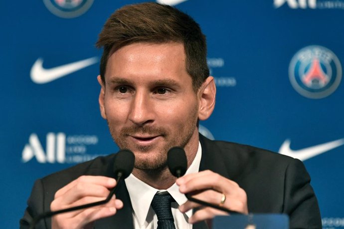 11 August 2021, France, Paris: Argentinian football player Lionel Messi speaks during his unveiling at the French football club Paris Saint-Germain's (PSG) Parc des Princes stadium. Messi signed a two-year deal with PSG, with the option of an additional