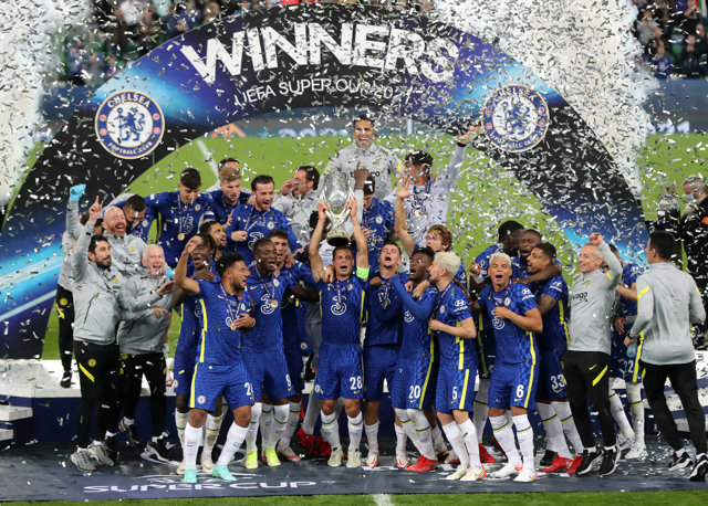 11 August 2021, United Kingdom, Belfast: Chelsea players celebrate with the trophy after winning the UEFA Super Cup soccer match against Villarreal CF at Windsor Park. Photo: Niall Carson/PA Wire/dpa