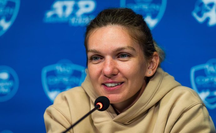 Simona Halep of Romania talks to the media after winning her first round match at the 2021 Western & Southern Open WTA 1000 tennis tournament
