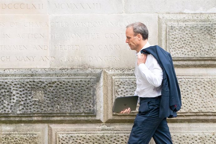 20 August 2021, United Kingdom, London: UK Secretary of State Dominic Raab arrives at the Foreign Office in Westminster, London. Raab faces mounting pressure to resign after not interrupting his holiday on the Greek island of Crete to make a phone call 