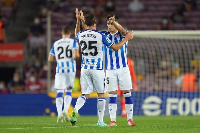 15 August 2021, Spain, Barcelona: Real Sociedad's Julen Lobete (R) celebrates scoring his side's first goal with teammate  Jon Bautista during the Spanish LaLiga soccer match between FC Barcelona and Real Sociedad at Camp Nou Stadium. Photo: -/LaPresse 