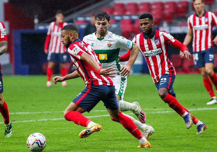 Archivo - Renan Lodi of Atletico de Madrid, Lucas Boye of Elche CF and Thomas Lemar of Atletico de Madrid  in action during La Liga football match played between Atletico de Madrid and Elche CF at Wanda Metropolitano stadium on December 19, 2020 in Madr