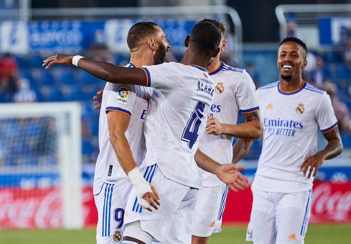 Karim Benzema of Real Madrid CF celebrates a goal with teammates during the Spanish league, La Liga Santander, football match played between Deportivo Alaves and Real Madrid CF at Mendizorroza stadium on August 14, 2021 in Vitoria, Spain.