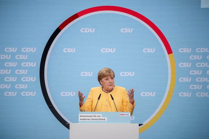 21 August 2021, Berlin: German Chancellor Angela Merkel speaks on stage at the kick-off of the CDU/CSU's central election campaign at the Tempodrom Berlin venue. Photo: Michael Kappeler/dpa