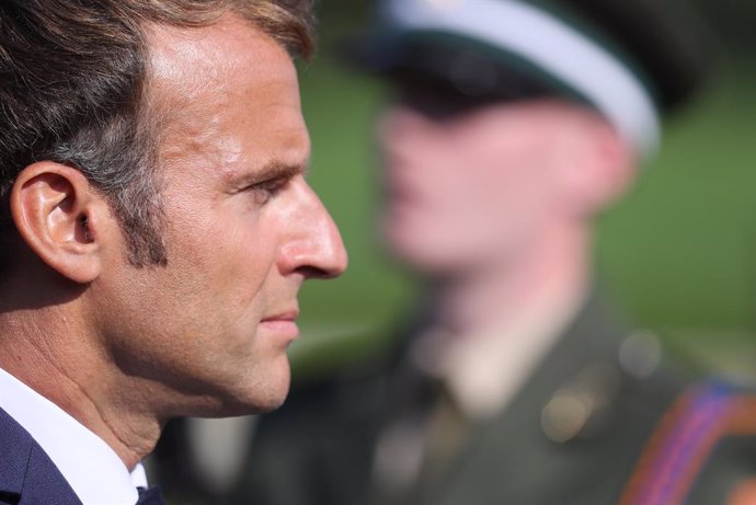 26 August 2021, Ireland, Dublin: French President Emmanuel Macron inspects a Guard of Honour at Aras an Uachtarain during a ceremonial welcome. Photo: Brian Lawless/PA Wire/dpa