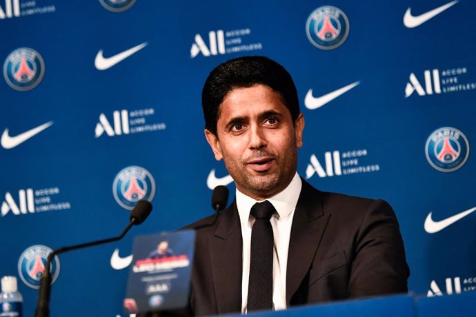 11 August 2021, France, Paris: Paris Saint-Germain's Qatari President Nasser Al-Khelaifi speaks during a press conference for the unveiling of Argentinian football player Lionel Messi (not pictured) at the French football club Paris Saint-Germain's (PSG