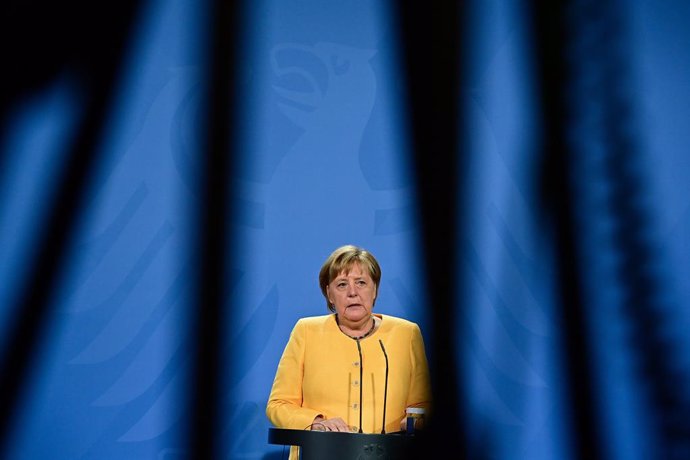 27 August 2021, Berlin: German Chancellor Angela Merkel speaks at a press conference after the G20 Compact with Africa conference at the Chancellery. Photo: Tobias Schwarz/AFP POOL/dpa