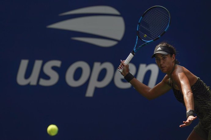 30 August 2021, US, New York: Spanish tennis player Garbine Muguruza in action against Croatian Donna Vekic during their women's singles first round tennis match of the US Open tennis championships. Photo: Seth Wenig/PA Wire/dpa