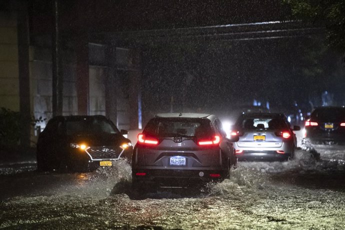 01 September 2021, US, New York: Cars drive through a flooded street in Staten Island, New York. Foothills of hurricane Ida have brought the heaviest rain since records began to the metropolis of New York. Photo: Kostas Lymperopoulos/CSM via ZUMA Wire/d