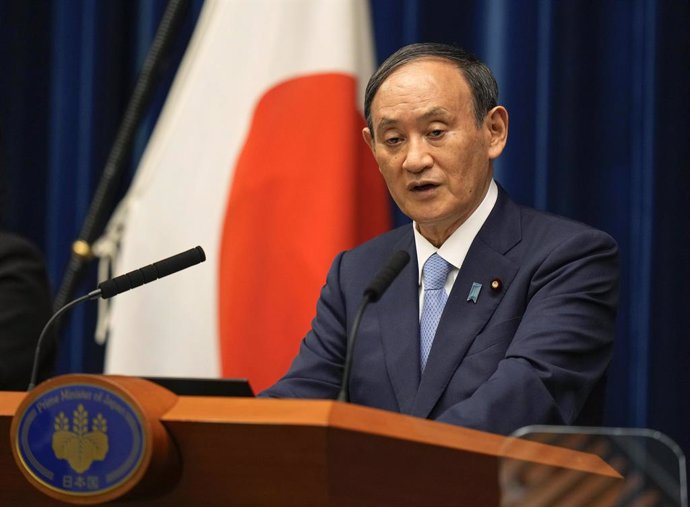 17 August 2021, Japan, Tokyo: Japanese Prime Minister Yoshihide Suga speaks during a press conference at the Prime Minister's Official Residence in Tokyo. Suga announced the extension of   Coronavirus state of emergency in six prefectures including Toky
