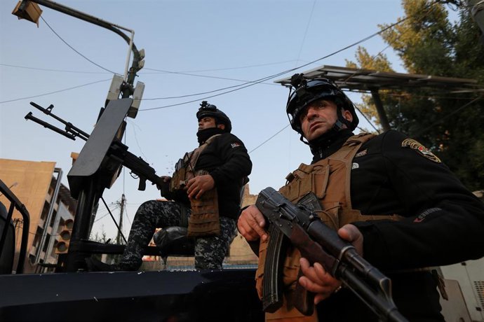 Archivo - Miembros de la Policía iraquí en Bagdad