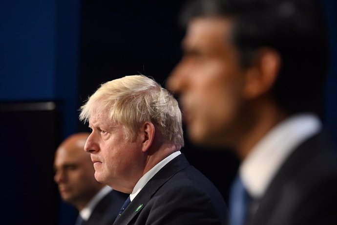 07 September 2021, United Kingdom, London: (L-R) UK Health Secretary Sajid Javid, UK Prime Minister Boris Johnson and Chancellor of the Exchequer Rishi Sunak, attend a media briefing in Downing Street on the long-awaited plan to fix the broken social ca