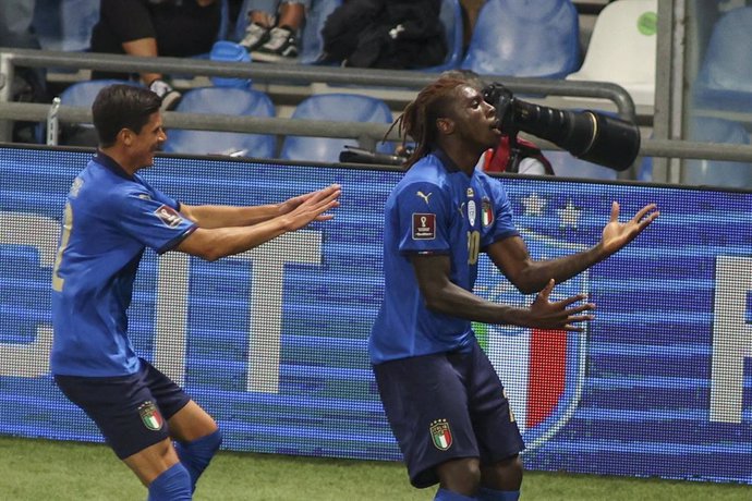 08 September 2021, Italy, Reggio Emilia: Italy's Moise Kean (R) celebrates scoring his side's first goal during the FIFA 2022 World Cup European qualification Group C soccer match between Italy and Lithuania at Mapei Stadium. Photo: Davide Casentini/LPS