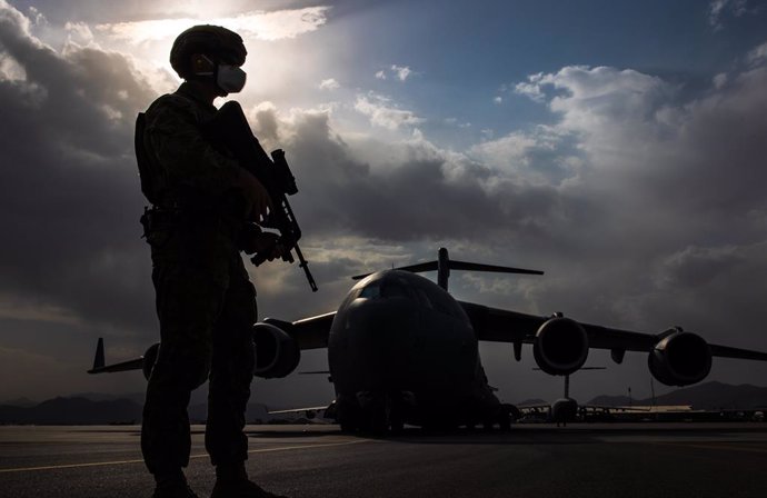 A supplied image obtained on Monday, August 23, 2021, of Royal Australian Air Force Airfield Defence Guards provide aircraft security at Hamid Karzai International Airport, Kabul, as Australian citizens and visa holders prepare to be evacuated from Afgh