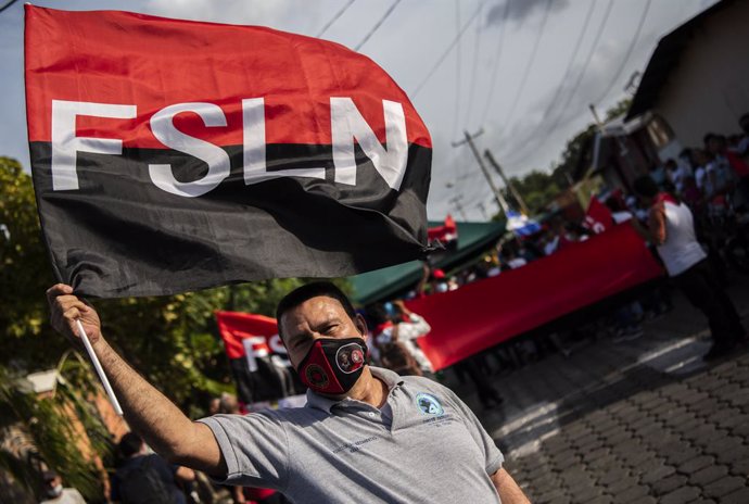 Archivo - 18 July 2021, Nicaragua, Managua: Asupporter of the Nicaraguan Sandinista National Liberation Front takes part in a march to celebrate the 42nd anniversary of the triumph of the Sandinista Revolution and in support of the ongoing anti-governm