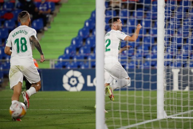 13 September 2021, Spain, Madrid: Elche's Lucas Perez (R) celebrates scoring his side's first goal during the Spanish LaLiga soccer match between Getafe CF and Elche CF at Coliseum Alfonso Perez Stadium. Photo: -/DAX via ZUMA Press Wire/dpa