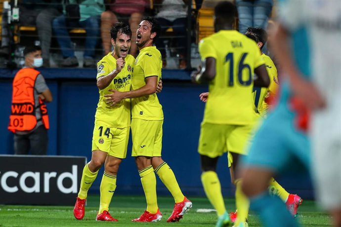 Manu Trigueros of Villarreal celebrates a goal with teammates during the UEFA Champions League, Group F, football match played between Villarreal CF and Atalanta BC at the Ceramica Stadium on September 14, 2021, in Villarreal, Spain.